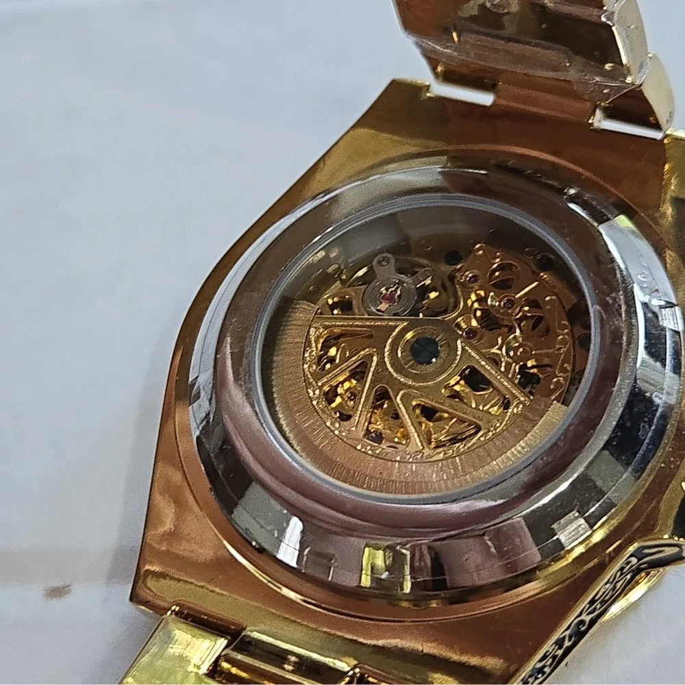 NWOB WLISTH Automatic Skeleton Watch. Gold/Black,SS Case & Strap.